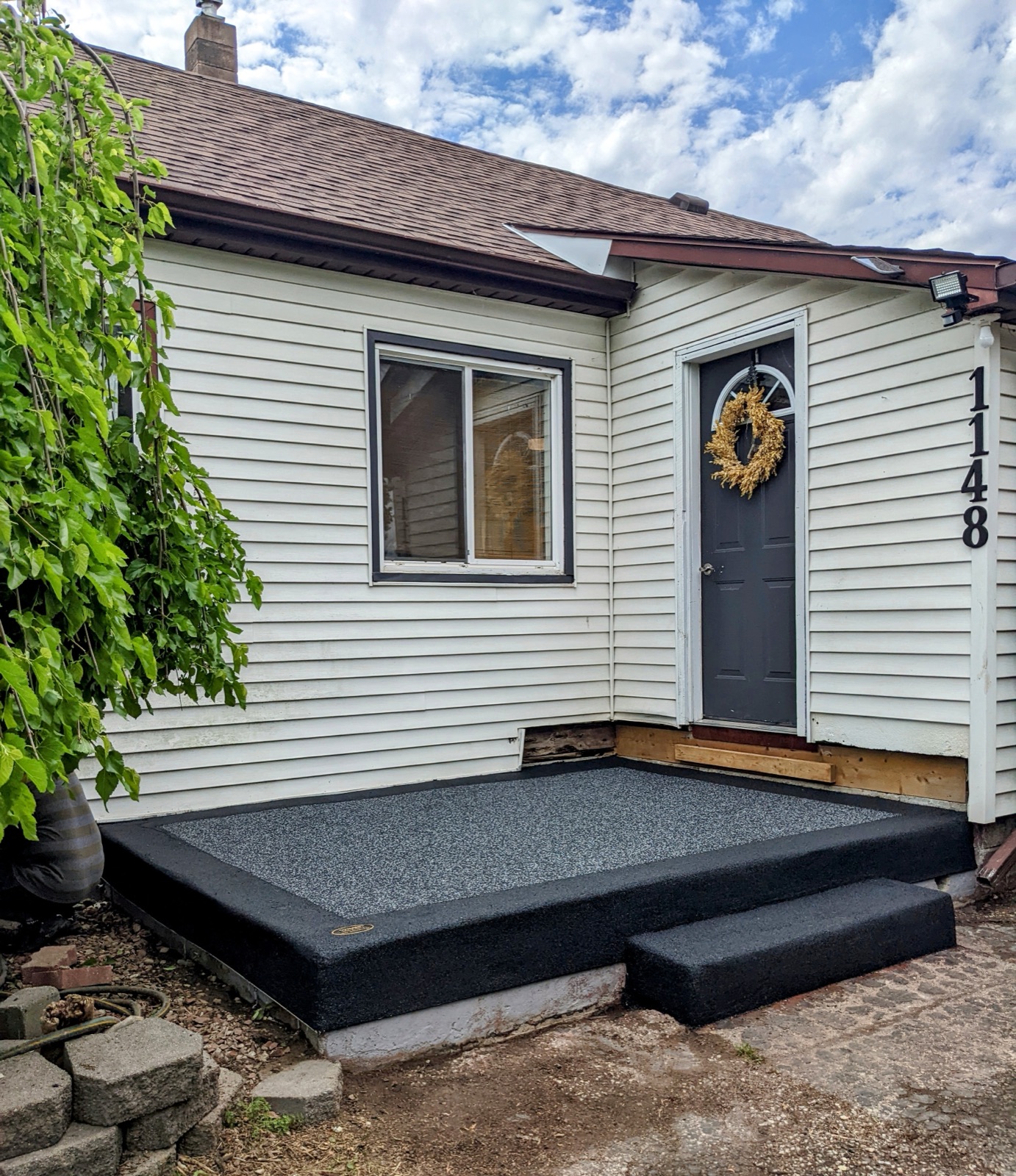 Black resin back porch — after