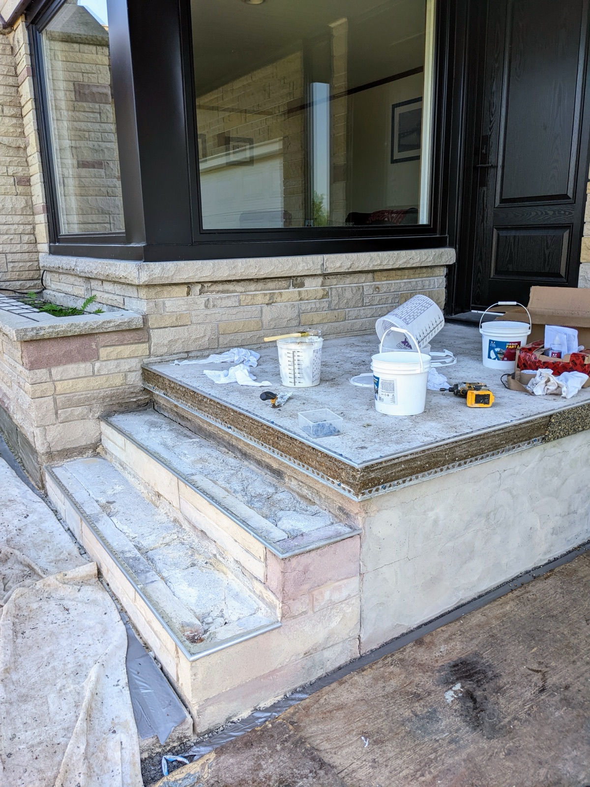 Step resurfacing tiling in progress