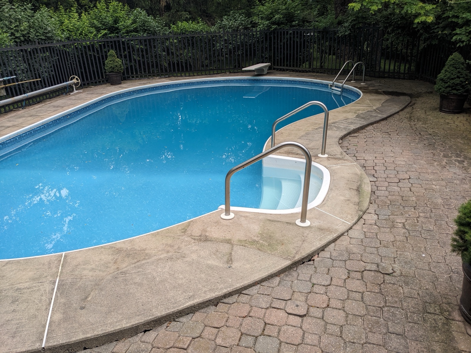 Oval pool deck before brown resin — before