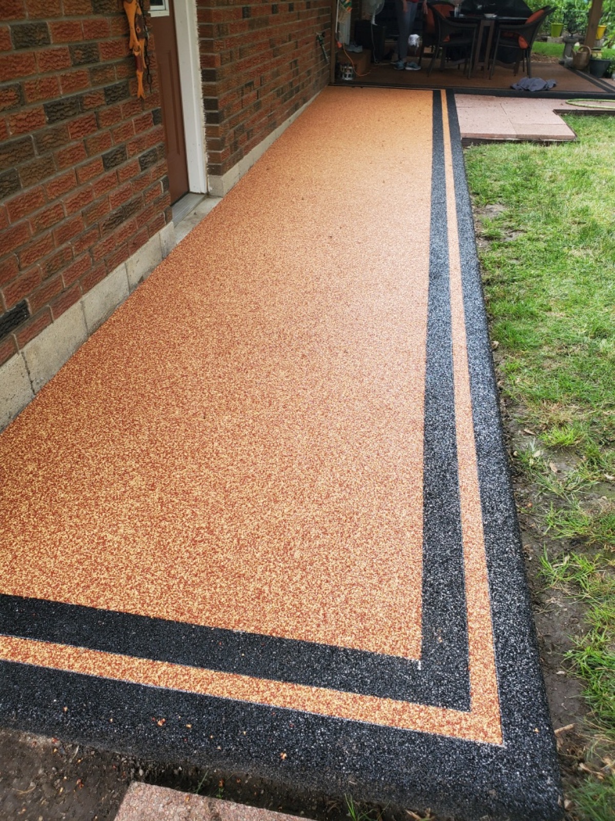 Orange permeable walkway with dark border — after
